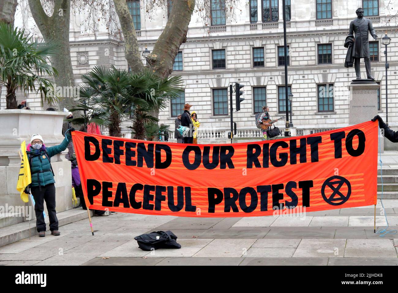 Defend right to peaceful protest banner hires stock photography and